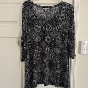 Woman Within Black and Gray Geometric Tunic